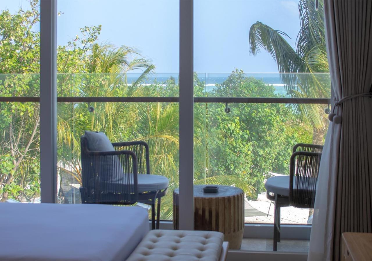Stone Beach Club Dhiffushi Esterno foto