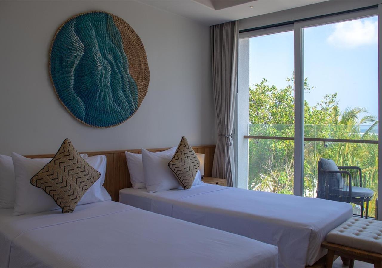 Stone Beach Club Dhiffushi Esterno foto